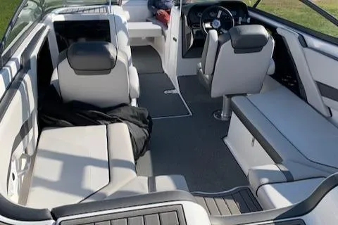 Slide: The Image of 2018 Yamaha Boats AR 240 interior with sleek seating and modern design. - 3
