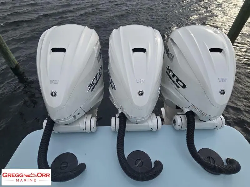 Slide: The Image of Triple Yamaha V8 outboard engines on a 2024 Regulator 37 boat by Gregg Orr Marine. - 14