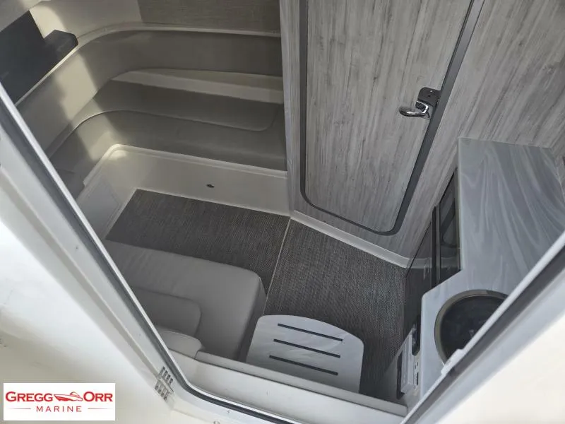 Slide: The Image of 2024 Regulator 37 cabin interior with seating and modern design. - 18