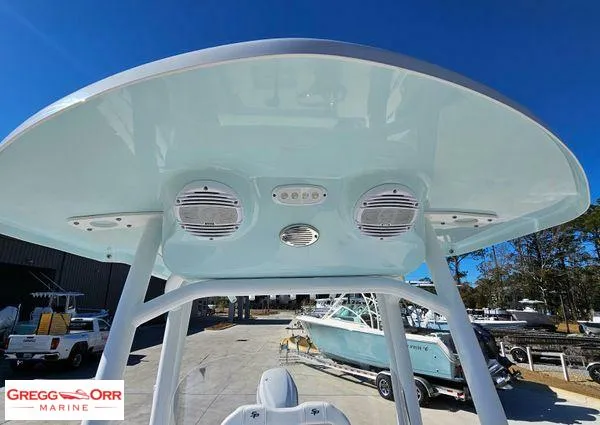 Slide: The Image of 2024 Sea Pro 222 CC boat with T-top and speakers at Gregg Orr Marine. - 12