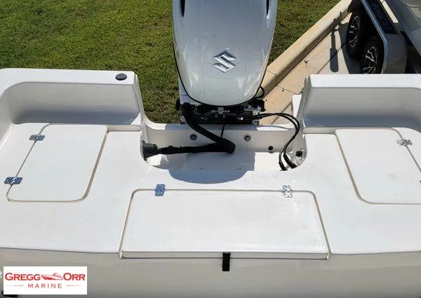 Slide: The Image of 2024 Bulls Bay 2200 boat with Suzuki outboard motor, displayed at Gregg Orr Marine. - 14