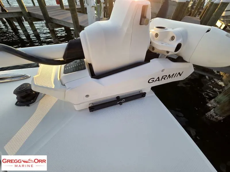 Slide: The Image of 2025 Regulator 26XO CROSSOVER boat with Garmin equipment at dockside. - 15