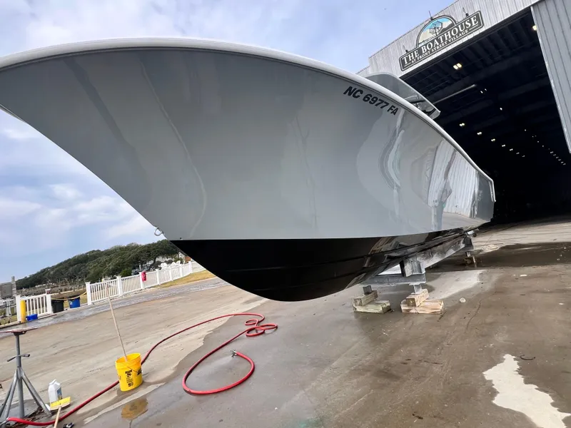 Slide: The Image of 2023 Front Runner 33 Center Console boat at marina, ready for launch. - 19