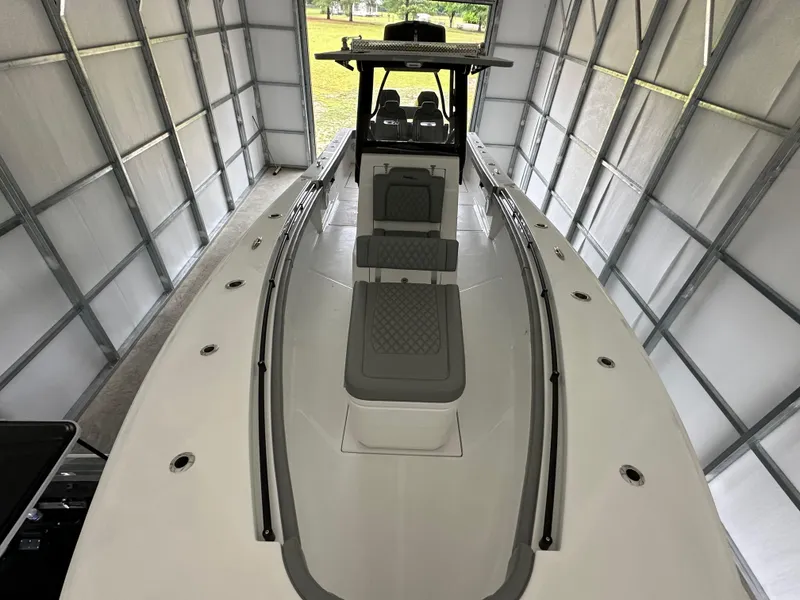 Slide: The Image of 2023 Front Runner 33 Center Console boat in storage, top view. - 32