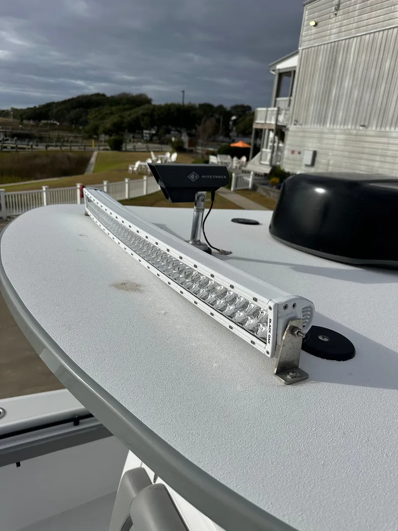 Slide: The Image of 2023 Front Runner 33 Center Console with LED light bar on deck. - 35