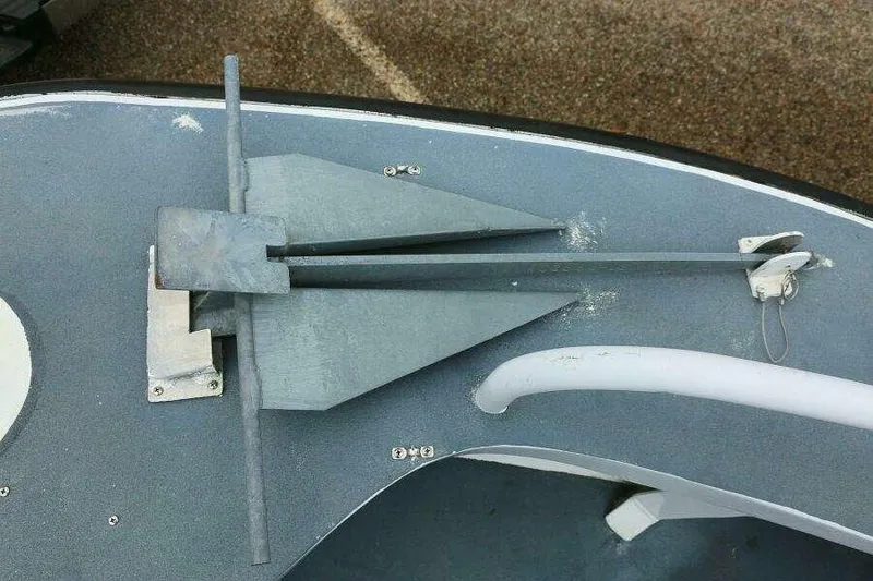 Slide: The Image of Anchor setup on a 2002 SeaArk 25 V Commander SAMA 1365 boat deck. - 22