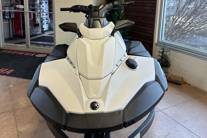 Slide: The Image of 2025 Yamaha WaveRunner JetBlaster LTD in showroom, front view, sleek design. - 10