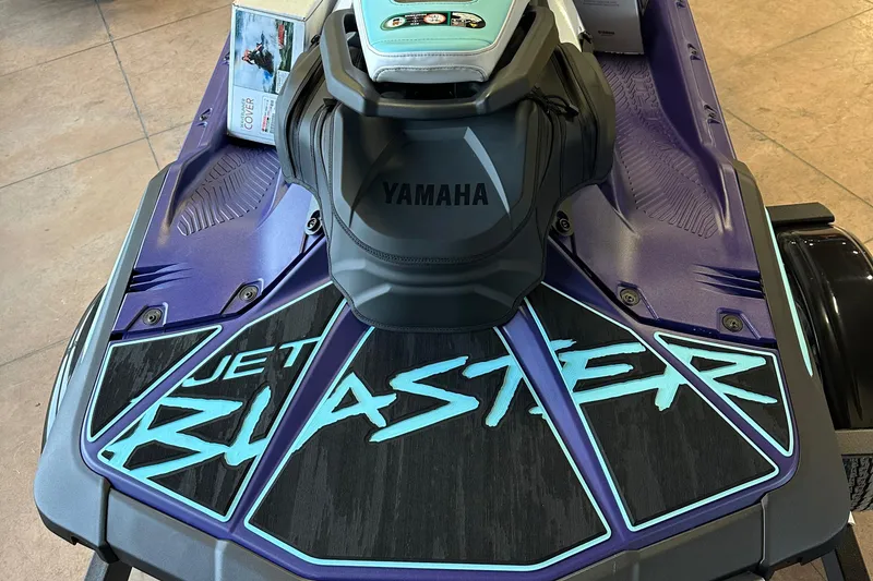 Slide: The Image of 2025 Yamaha WaveRunner JetBlaster LTD, purple and black design, top view. - 12