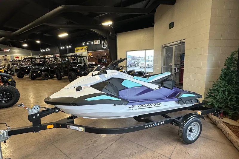 Slide: The Image of 2025 Yamaha WaveRunner JetBlaster LTD on trailer in showroom. - 8