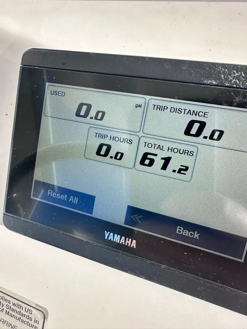 Slide: The Image of Yamaha display showing 61.2 total hours on 2024 Regulator 24XO boat. - 17