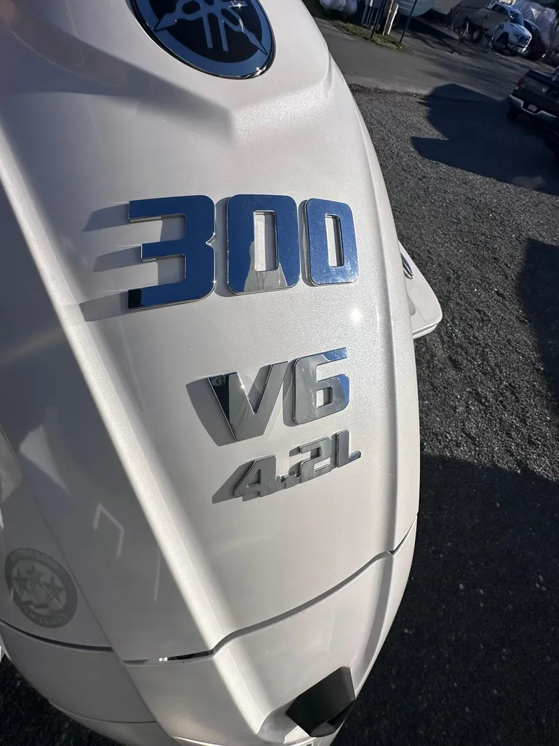Slide: The Image of 2024 Regulator 24XO boat engine, 300 V6 4.2L, close-up view. - 7