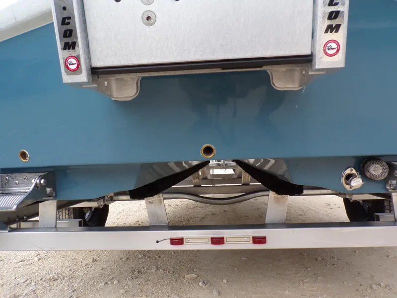 Slide: The Image of Shoalwater 19 CAT 2025 boat trailer detail, showing rear view and components. - 11