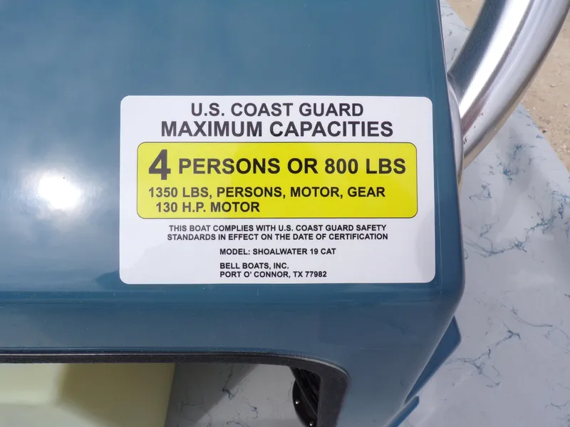 Slide: The Image of Shoalwater 19 CAT 2025 boat capacity label, 4 persons or 800 lbs, 130 HP motor. - 25