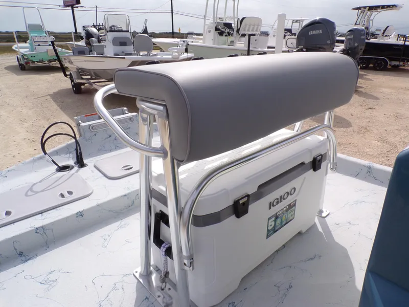 Slide: The Image of Shoalwater 19 CAT 2025 boat with Igloo cooler and seating on deck. - 26