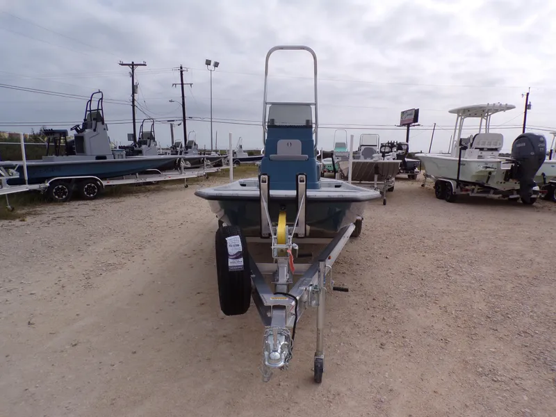 Slide: The Image of 2025 Shoalwater 19 CAT boat on trailer in outdoor dealership lot. - 5