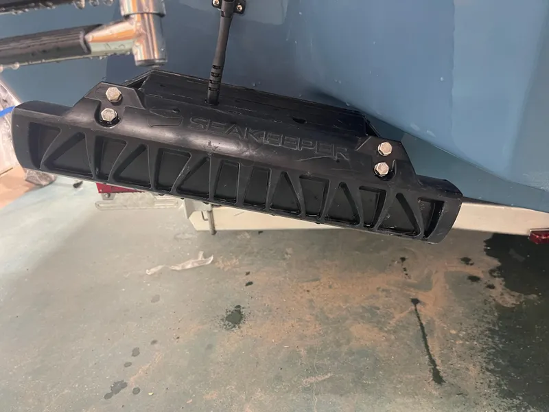 Slide: The Image of Seakeeper device on 2025 Tidewater 232LXF boat hull, enhancing stability. - 13