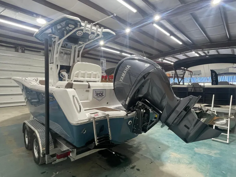 Slide: The Image of 2025 Tidewater 232LXF boat with Yamaha engine in showroom. - 7