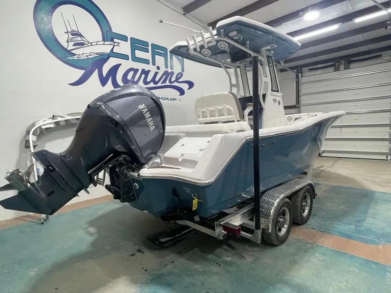 Slide: The Image of 2025 Tidewater 232LXF boat with Yamaha engine in showroom. - 8