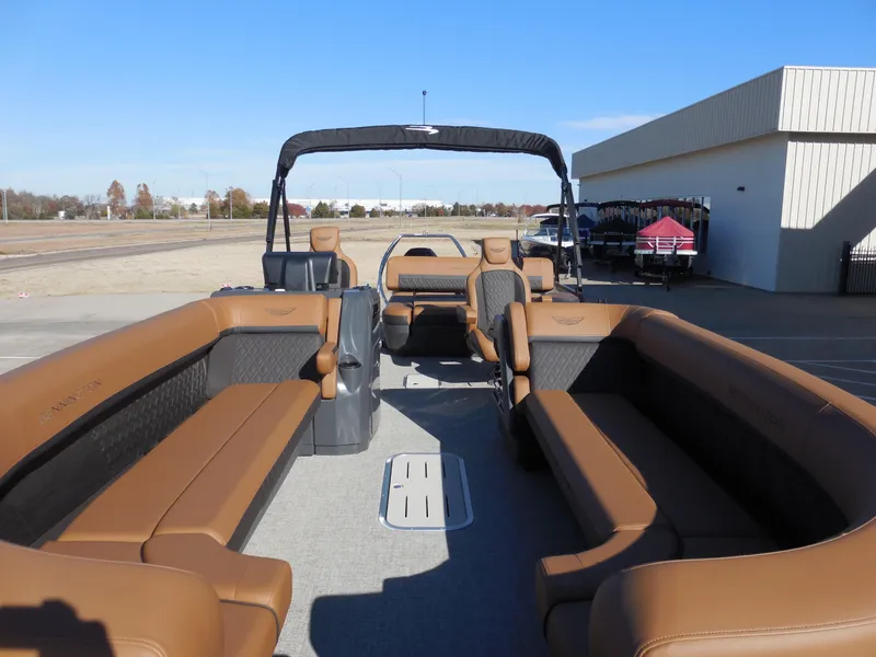 Slide: The Image of 2025 Bennington 26 MSB pontoon boat with spacious seating and modern design. - 7