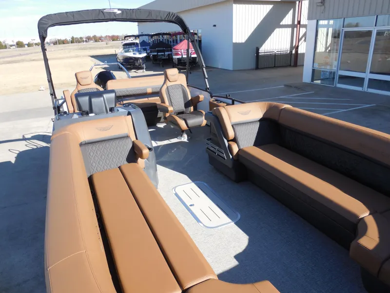 Slide: The Image of 2025 Bennington 26 MSB pontoon boat with luxurious seating and modern design. - 8