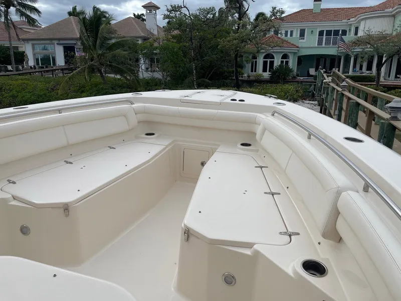 Slide: The Image of 2019 Grady-White Canyon 336 boat interior with spacious seating and cup holders. - 5