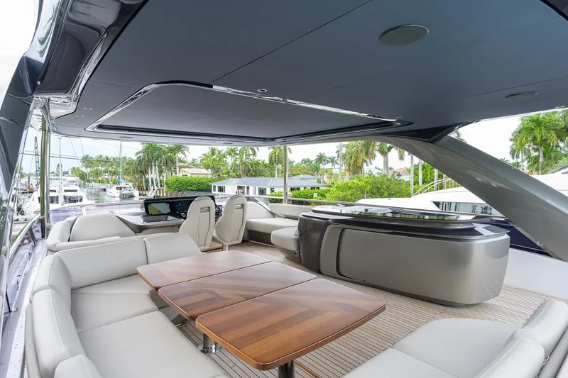 Slide: The Image of Luxurious 2022 Princess Y85 Motor Yacht with spacious outdoor seating and elegant design. - 11