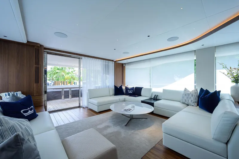 Slide: The Image of Luxurious interior of 2022 Princess Y85 Motor Yacht with modern white seating. - 19