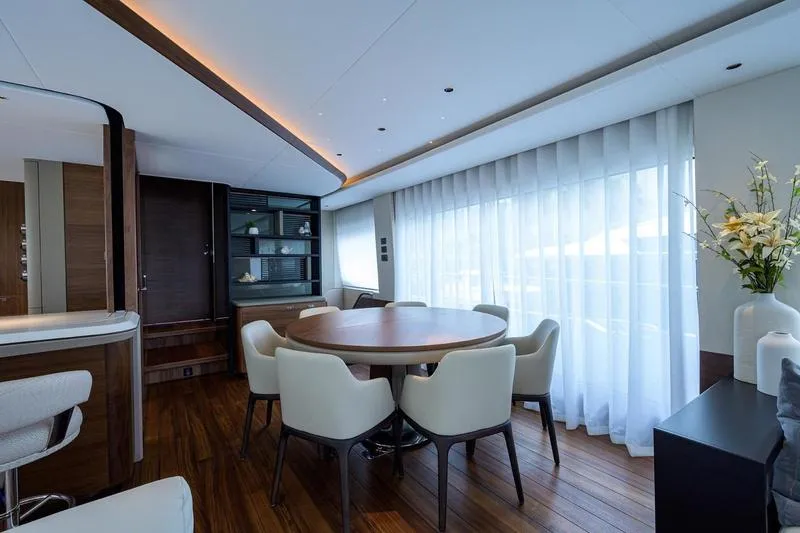 Slide: The Image of Luxurious interior of 2022 Princess Y85 Motor Yacht with elegant dining area. - 22
