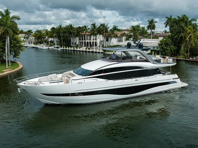 Slide: The Image of 2022 Princess Y85 Motor Yacht cruising in a tropical waterway. - 3