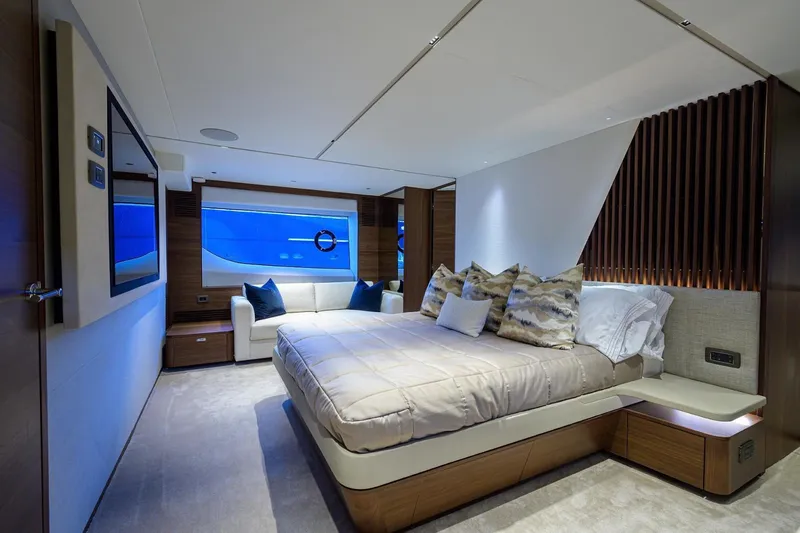 Slide: The Image of Luxurious bedroom interior of 2022 Princess Y85 Motor Yacht with modern design and ocean view. - 30
