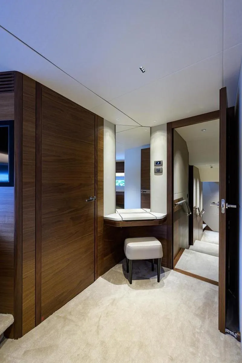 Slide: The Image of Luxurious interior of 2022 Princess Y85 Motor Yacht with modern wood finishes. - 38