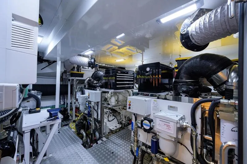 Slide: The Image of Engine room of 2022 Princess Y85 Motor Yacht, showcasing advanced machinery and equipment. - 44