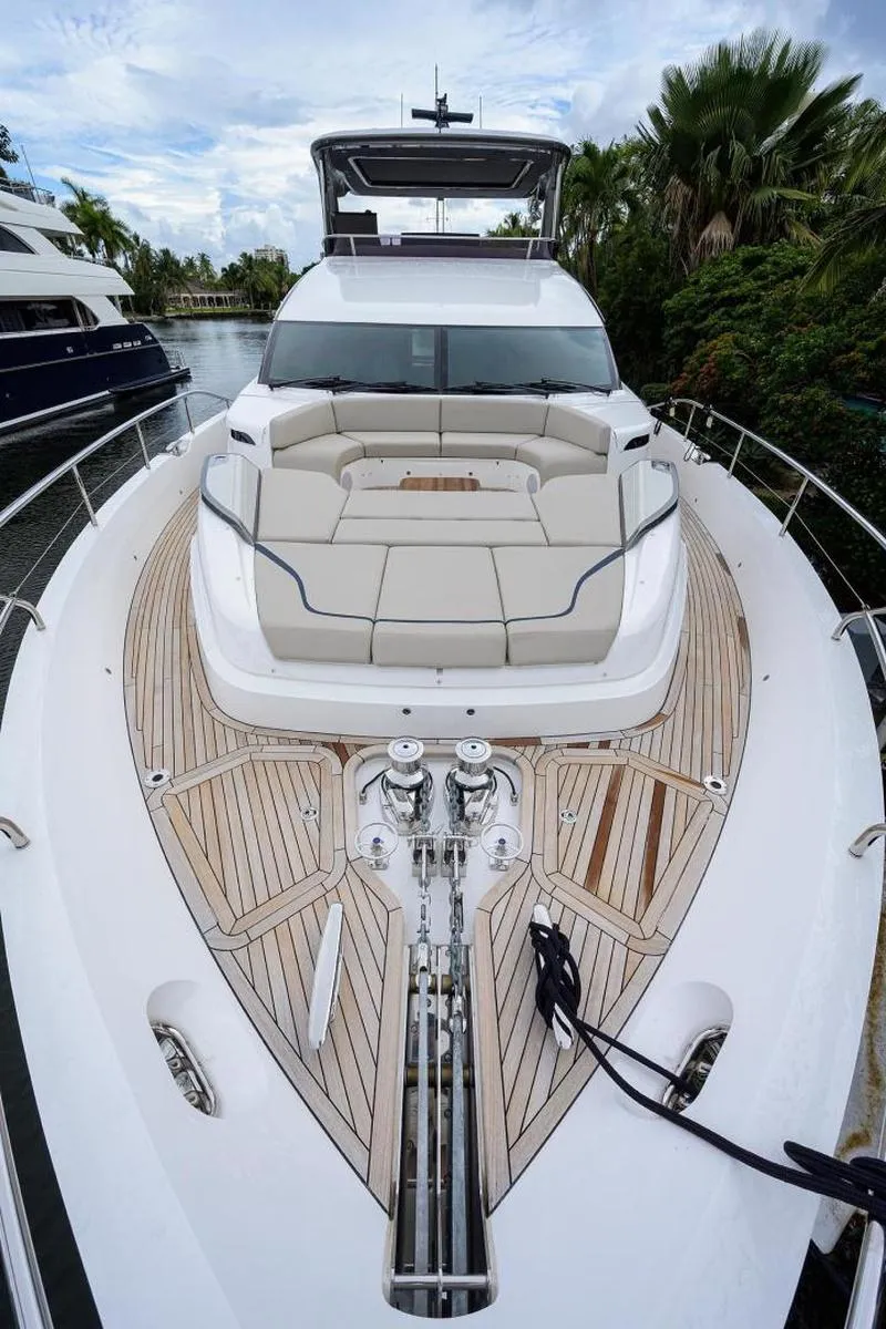 Slide: The Image of 2022 Princess Y85 Motor Yacht with spacious deck and luxurious seating. - 9