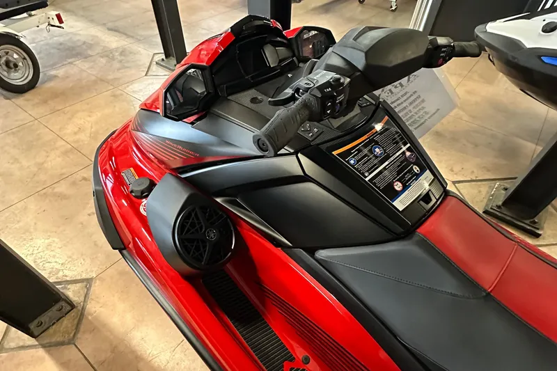 Slide: The Image of 2025 Yamaha WaveRunner VX Deluxe, red and black, detailed view of controls and seating. - 7