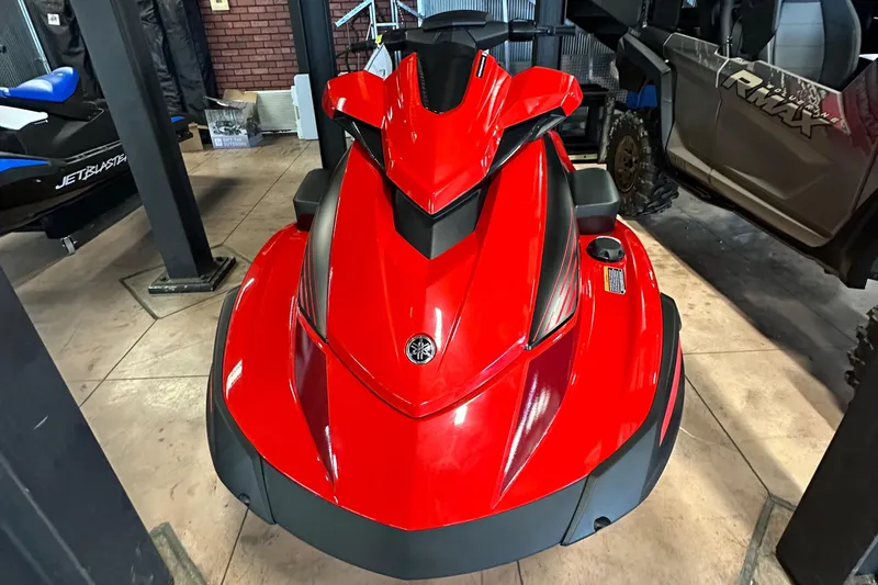 Slide: The Image of 2025 Yamaha WaveRunner VX Deluxe in vibrant red, displayed indoors. - 9