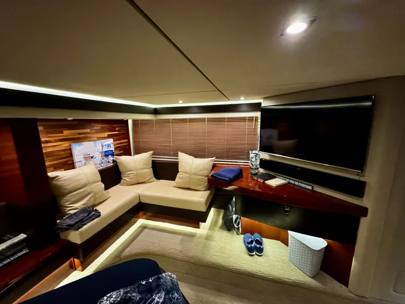 Slide: The Image of Luxurious interior of 2017 Sea Ray L590 yacht with cozy seating and modern decor. - 33