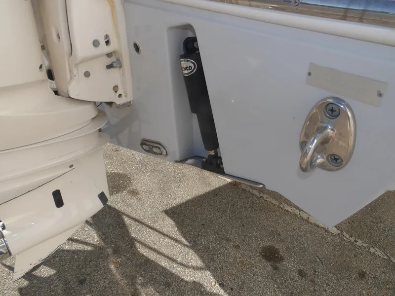 Slide: The Image of 2020 Cobia 320 Center Console boat transom with motor mount and cleat. - 18