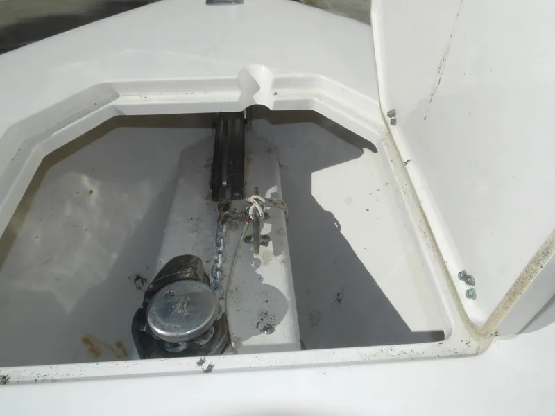 Slide: The Image of Anchor storage compartment on 2020 Cobia 320 Center Console boat. - 26