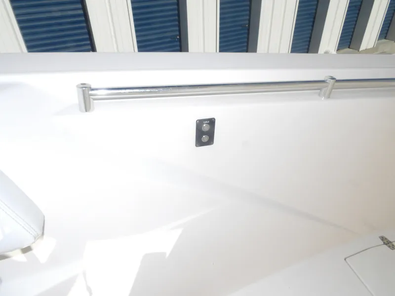 Slide: The Image of Interior view of a 2020 Cobia 320 Center Console boat with stainless steel railing. - 28