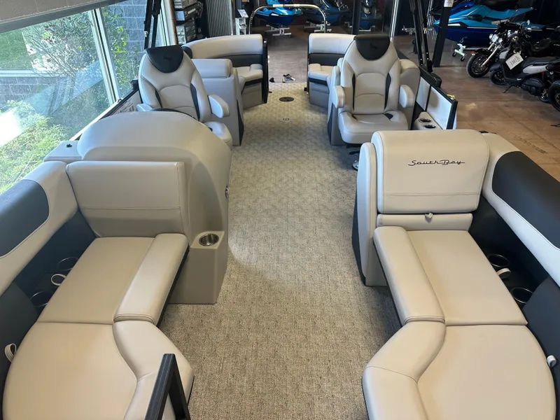 Slide: The Image of 2025 South Bay 222 RS LE pontoon boat interior with luxurious seating and modern design. - 6