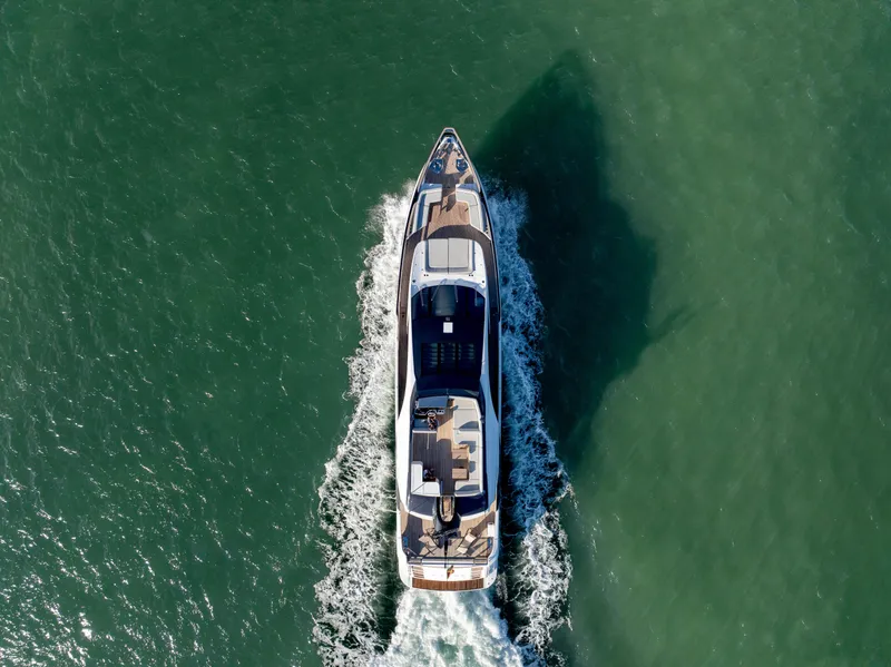 Slide: The Image of Aerial view of 2021 Azimut S10 yacht cruising on open water. - 15
