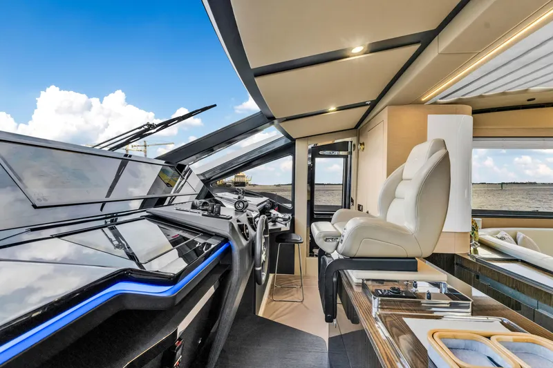 Slide: The Image of Luxurious interior of 2021 Azimut S10 yacht with modern helm and seating. - 25