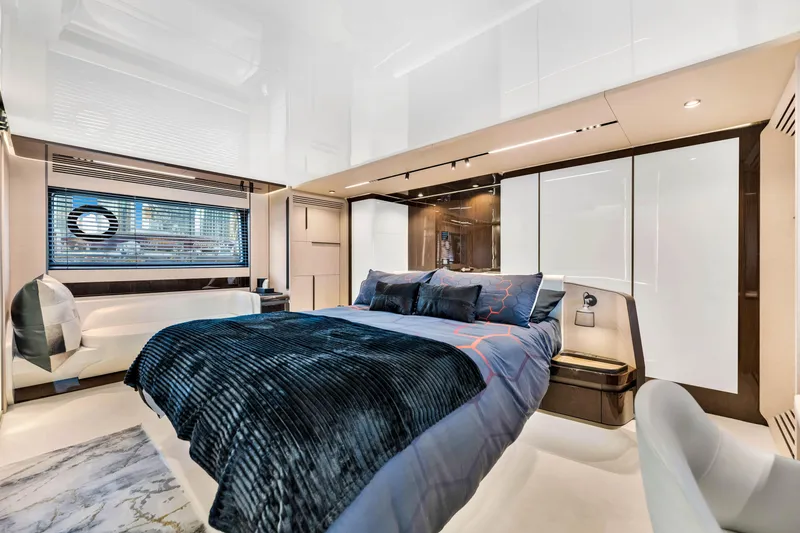 Slide: The Image of Luxurious bedroom interior of 2021 Azimut S10 yacht with modern design and elegant furnishings. - 29