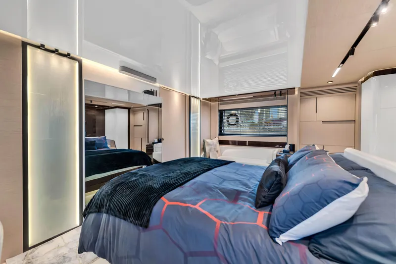 Slide: The Image of Luxurious bedroom interior of 2021 Azimut S10 yacht with modern design and elegant furnishings. - 32
