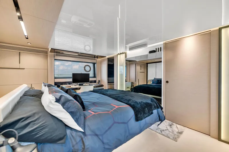 Slide: The Image of Luxurious bedroom interior of 2021 Azimut S10 yacht with modern design and cozy bedding. - 33