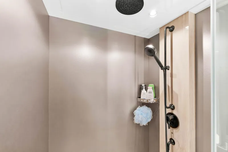 Slide: The Image of Luxurious shower in 2021 Azimut S10 yacht with modern fixtures and toiletries. - 39