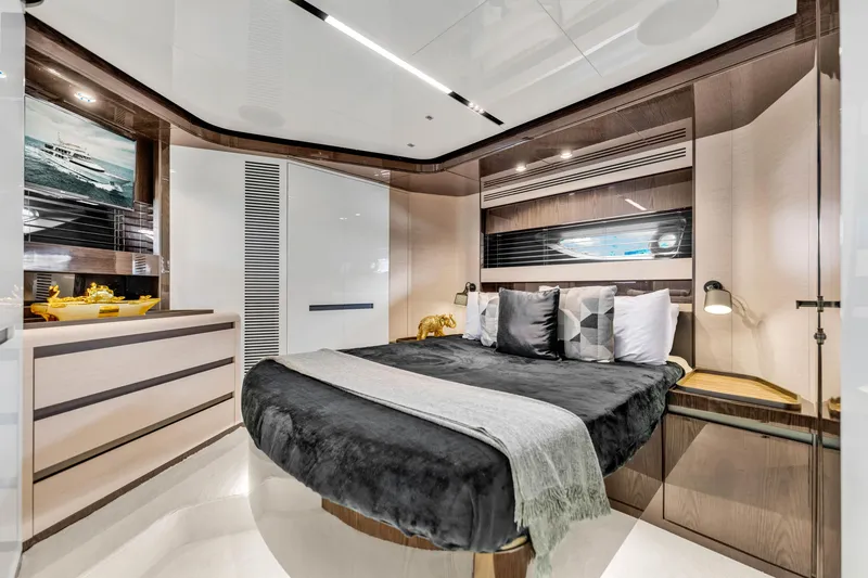 Slide: The Image of Luxurious 2021 Azimut S10 yacht bedroom with modern design and elegant furnishings. - 40