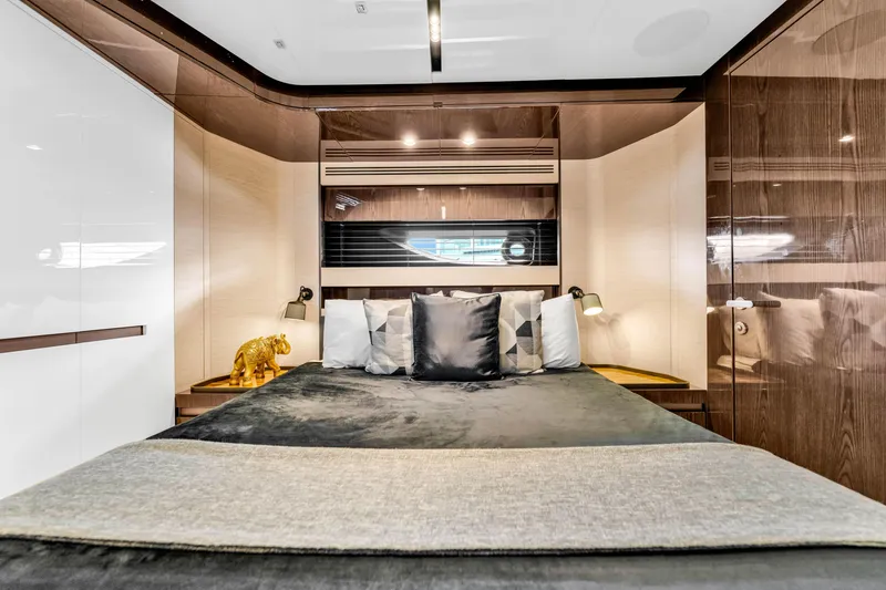 Slide: The Image of Luxurious bedroom interior of 2021 Azimut S10 yacht with modern design and elegant decor. - 41