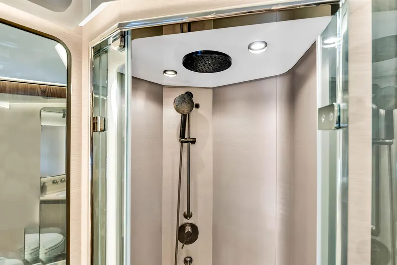 Slide: The Image of Luxurious shower in 2021 Azimut S10 yacht, featuring modern fixtures and elegant design. - 47