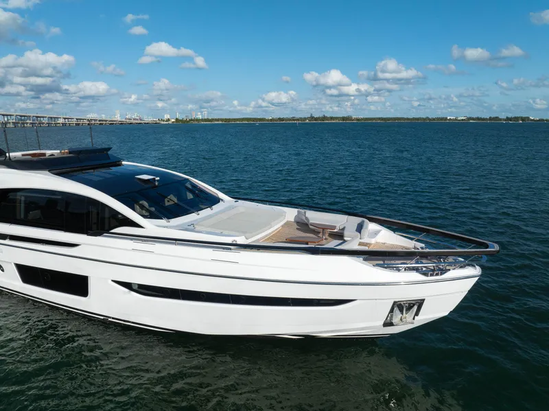 Slide: The Image of Azimut S10 2021 luxury yacht cruising on open water under blue skies. - 7
